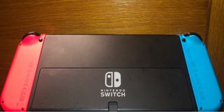 Nintendo Switch OLED Azul/Rojo + Accesorios