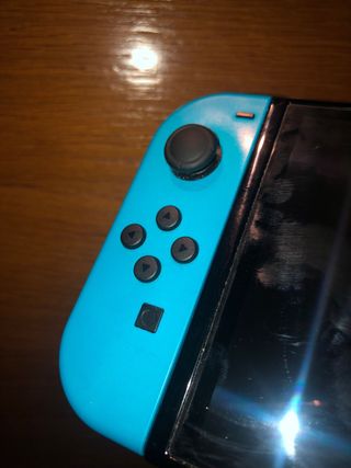 Nintendo Switch OLED Azul/Rojo + Accesorios