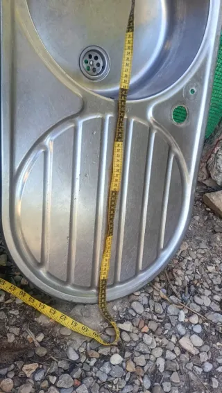 Fregadero de acero inoxidable con escurridor