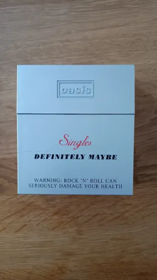 Caja Singles Definitely Maybe Oasis