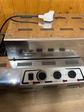 Tostador de cadena poco uso