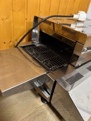 Tostador de cadena poco uso