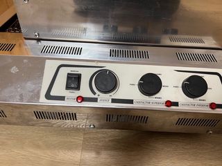 Tostador de cadena poco uso