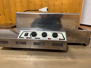 Tostador de cadena poco uso