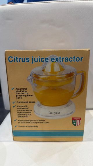 Exprimidor eléctrico naranja