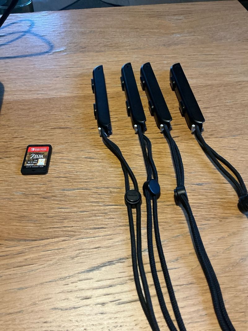 Nintendo Switch + 4 Joy-Cons + Zelda BOTW + Case afbeelding 3