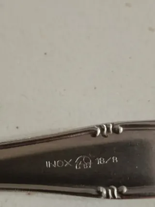 Cucchiaino curvo per bambini in acciaio