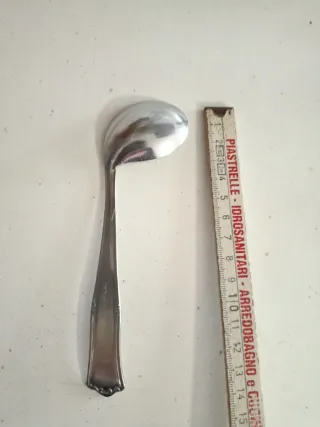 Cucchiaino curvo per bambini in acciaio