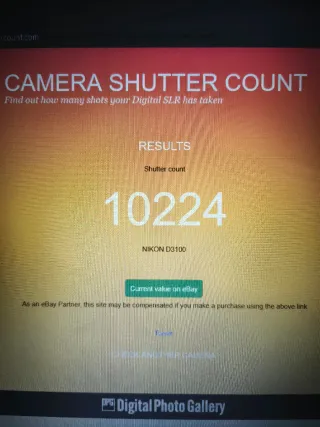 Cámara Nikon D3100 con objetivo 55-200mm