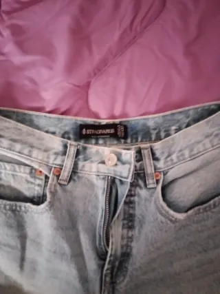 Vaqueros desgastados de tiro alto