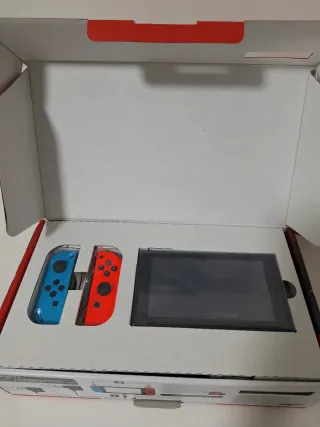 Nintendo Switch con caja y accesorios
