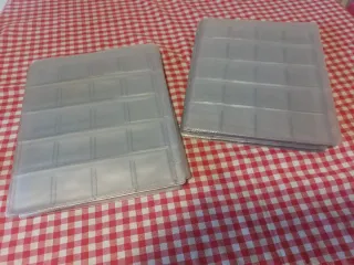 50 Hojas plástico sellos/monedas.