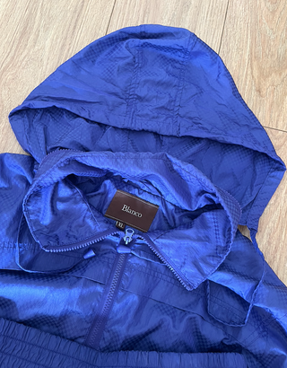 Chaqueta impermeable morada