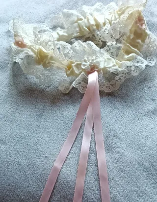 Liga de novia encaje blanco lazo rosa