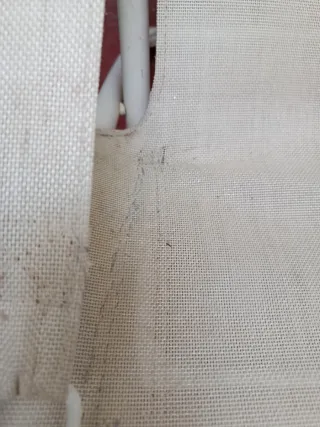 Tumbona plegable beige y blanca