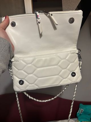 Bolso blanco con alas