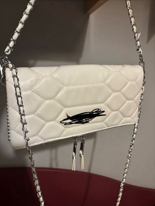 Bolso blanco con alas