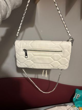 Bolso blanco con alas