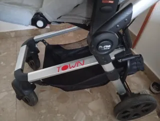 Carrito de bebé gris sin masicosi