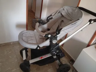 Carrito de bebé gris sin masicosi