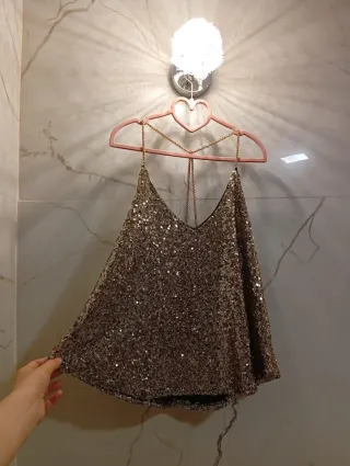 Top lentejuelas dorado y negro