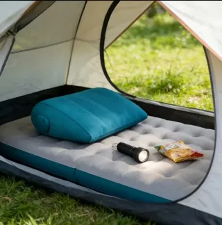 Almohada inflable triangular portátil