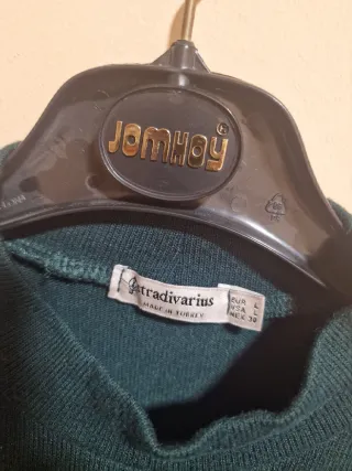 Jersey fino verde con mangas abullonadas