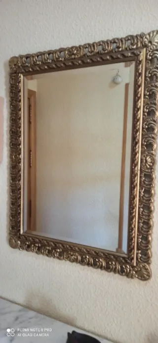Espejo antiguo bronce con marco decorado