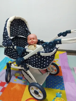 Carrito de muñecas azul con lunares blancos