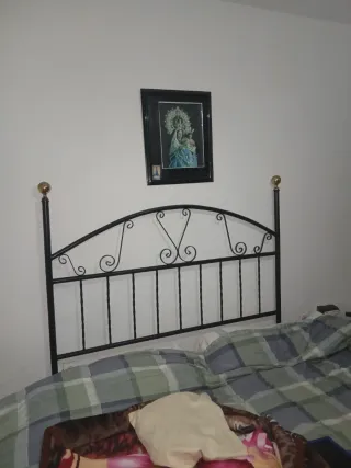 Cabecero de forja negro y dorado