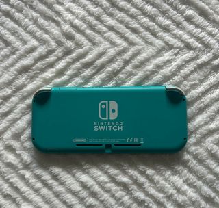 Nintendo Switch Lite con funda y caja original
