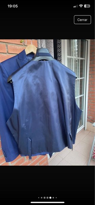 Traje azulón chaleco y corbata