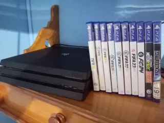 PS4 Pro Negra con 10 juegos y sin mando