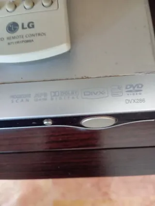 Reproductor DVD LG con mando original