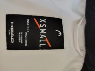 Chaqueta de esquí HEAD gris y blanca