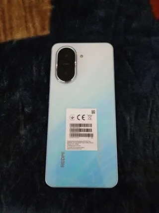 Teléfono Redmi Azul/Blanco + Funda Transparente