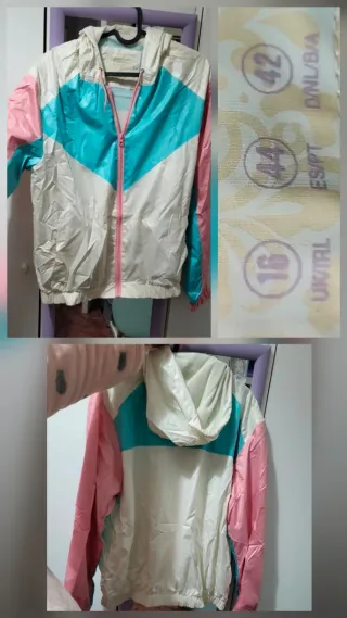 Cortavientos con capucha y cremallera