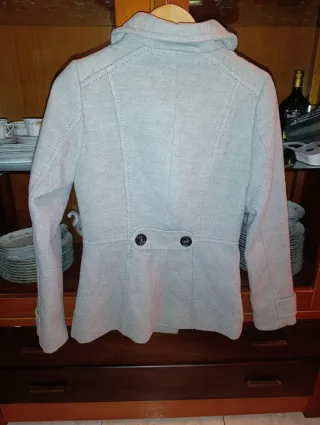 Abrigo gris doble botonadura