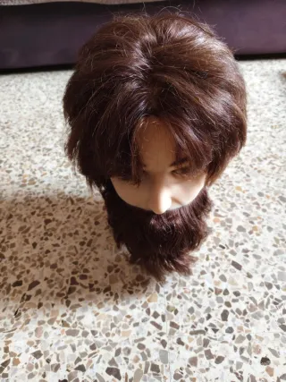 Cabeza peluquería castaña