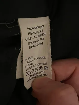 Abrigo negro mujer con cinturón