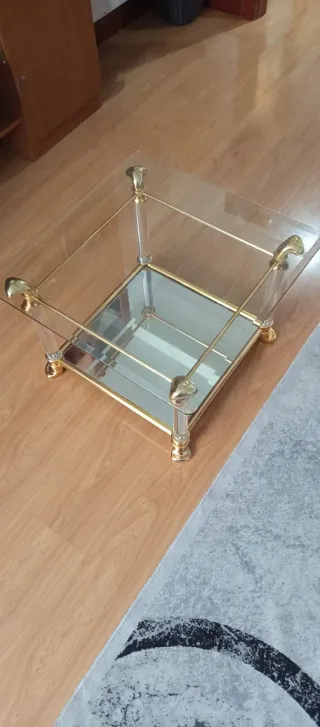 Mesa de centro cristal y metal dorado