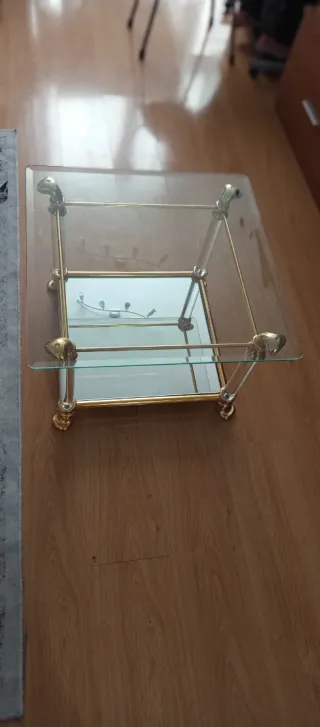 Mesa de centro cristal y metal dorado