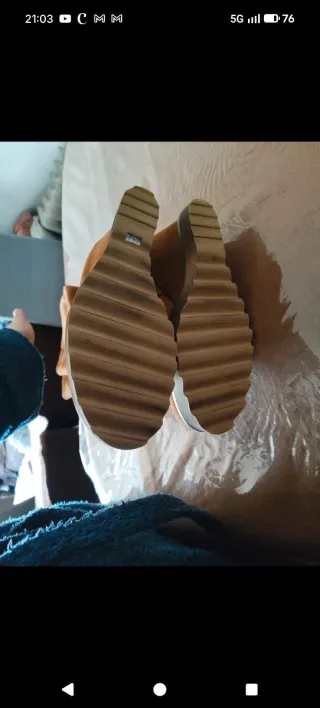 Botas altas de piel con flecos