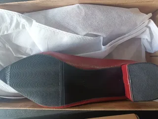 Sapatos de salto alto vermelhos