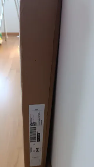 Cabecero de cama blanco con estantería