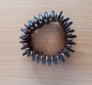 Par de pulseras artesanales de coco y madera