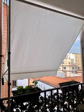 Toldo impermeable terraza ajustable