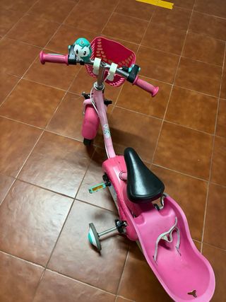 Bicicleta niña rosa con ruedines
