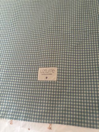 Colcha y protector de cuna