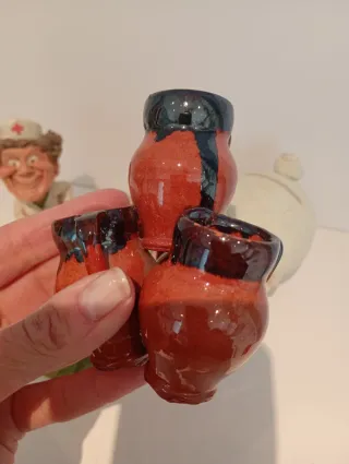 6 Figuras cerámica y resina: cerdito, enfermera..